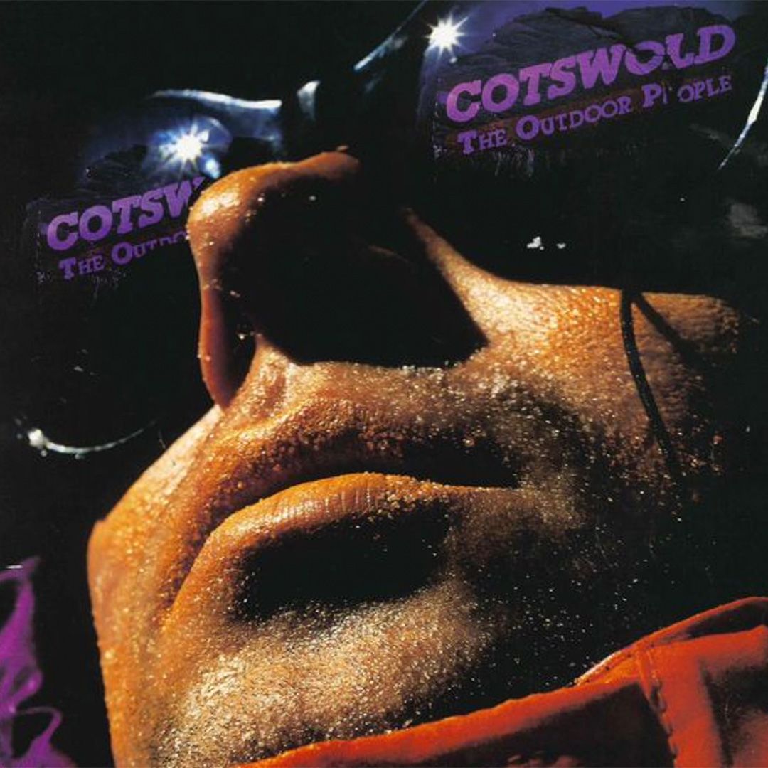 Close-up on a person wearing sunglasses with branding that reads: Cotswold, The Outdoor People
